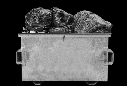 Electric collection van operating in a town street